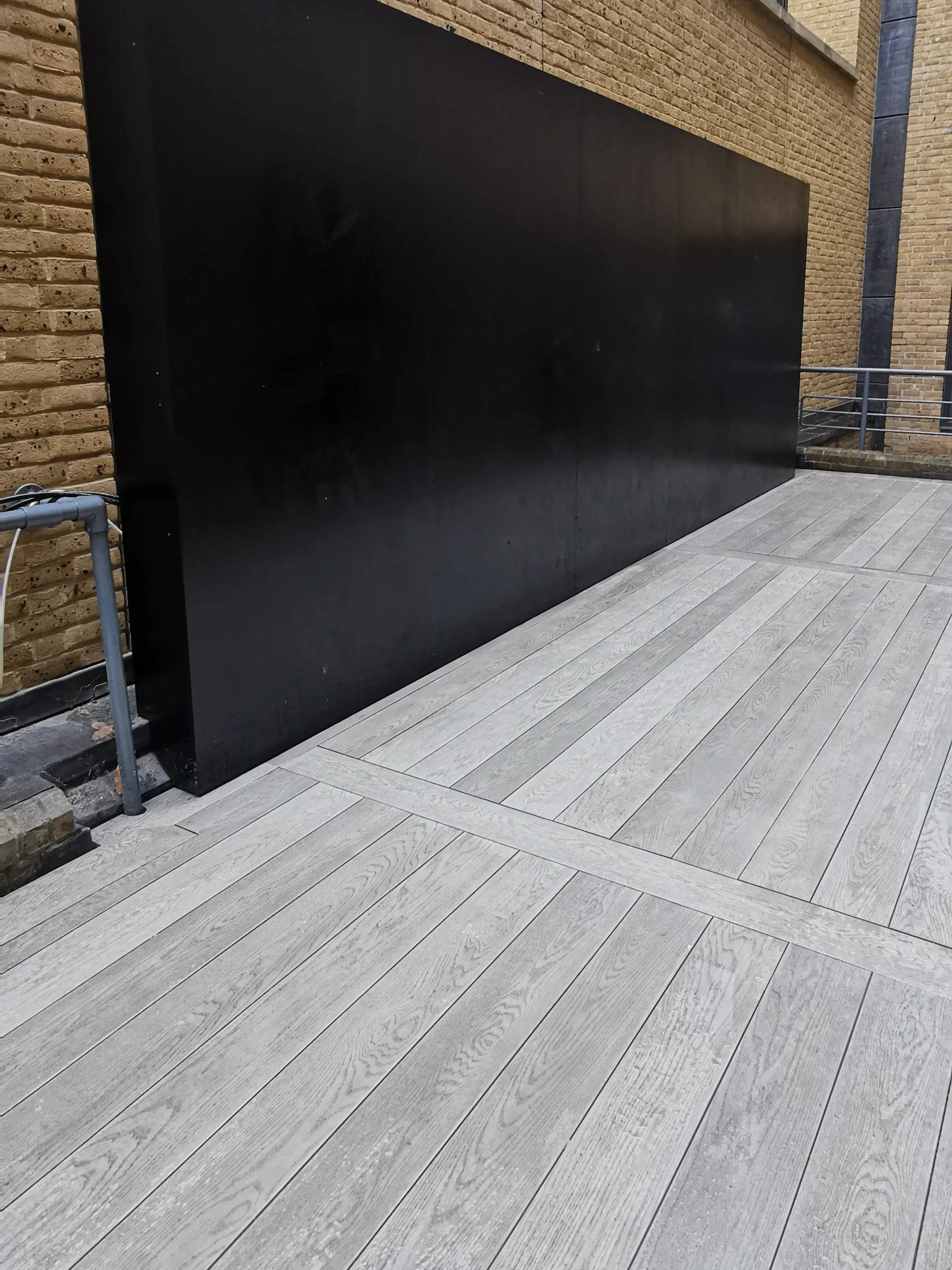 Millboard Decking, Steel Pergola & Privacy Screen Central London.jpg