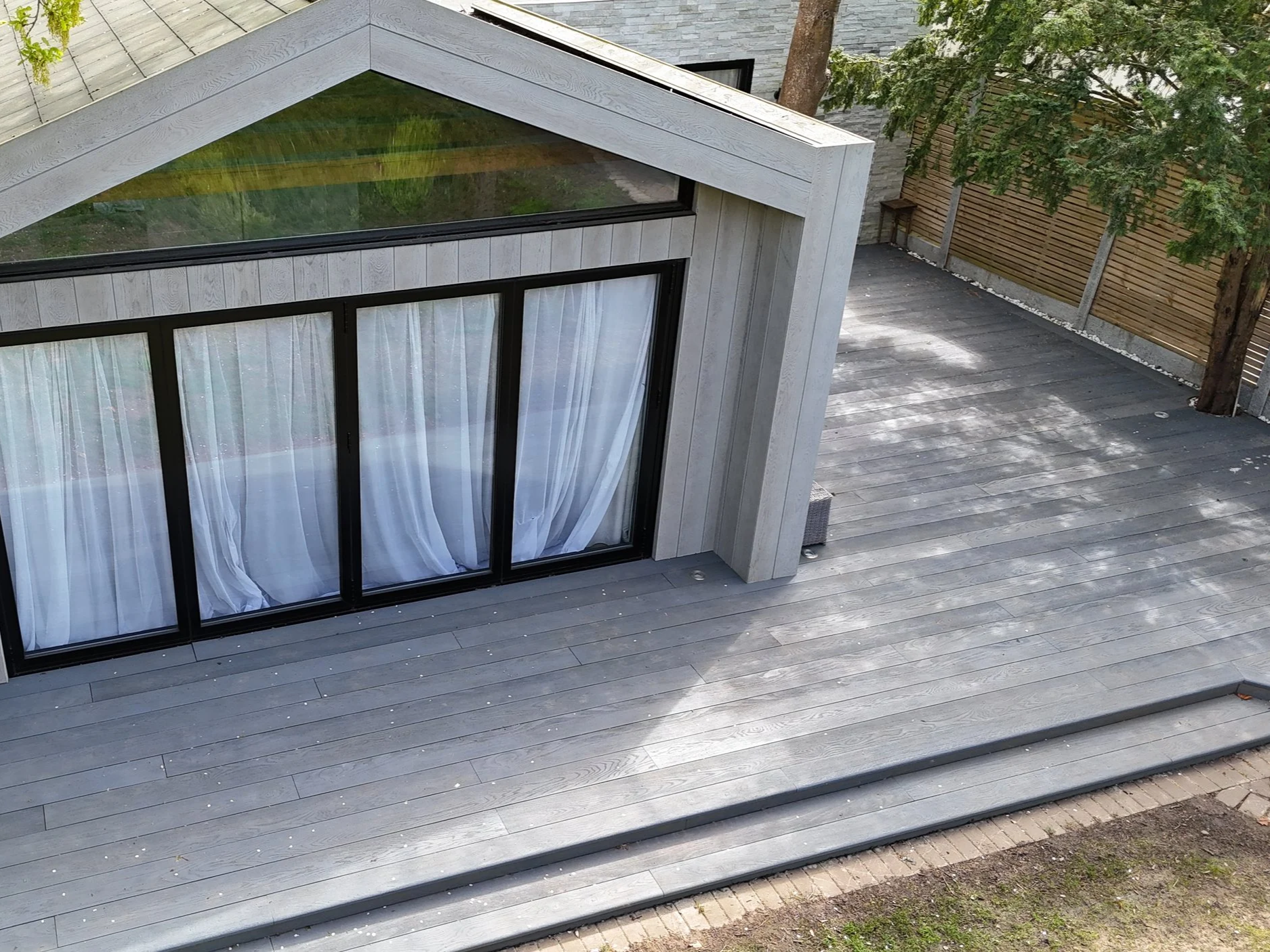 Millboard Composite Cladding in London Bespoke garden room.png