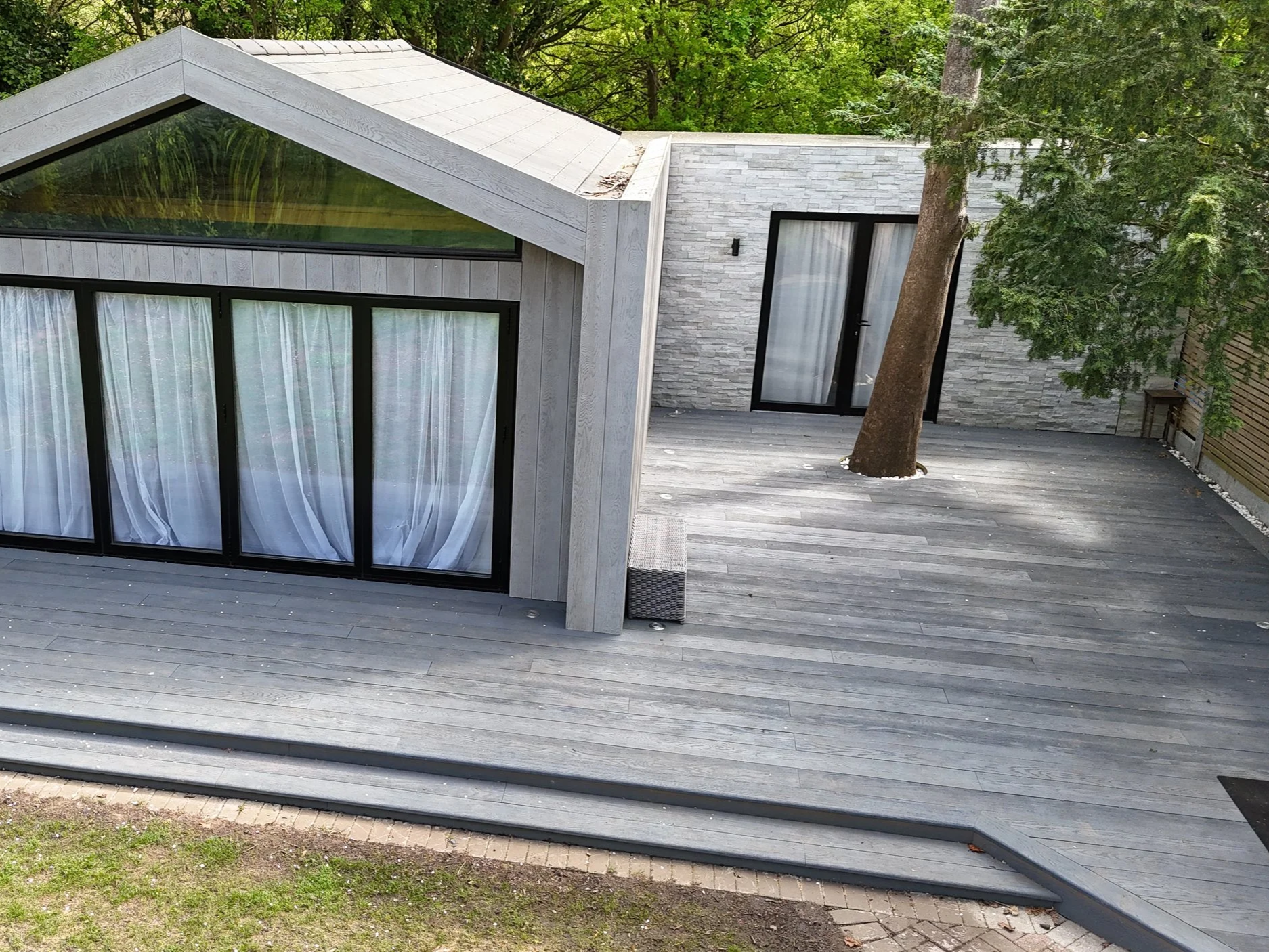 Millboard Composite Cladding in London Bespoke garden room.png