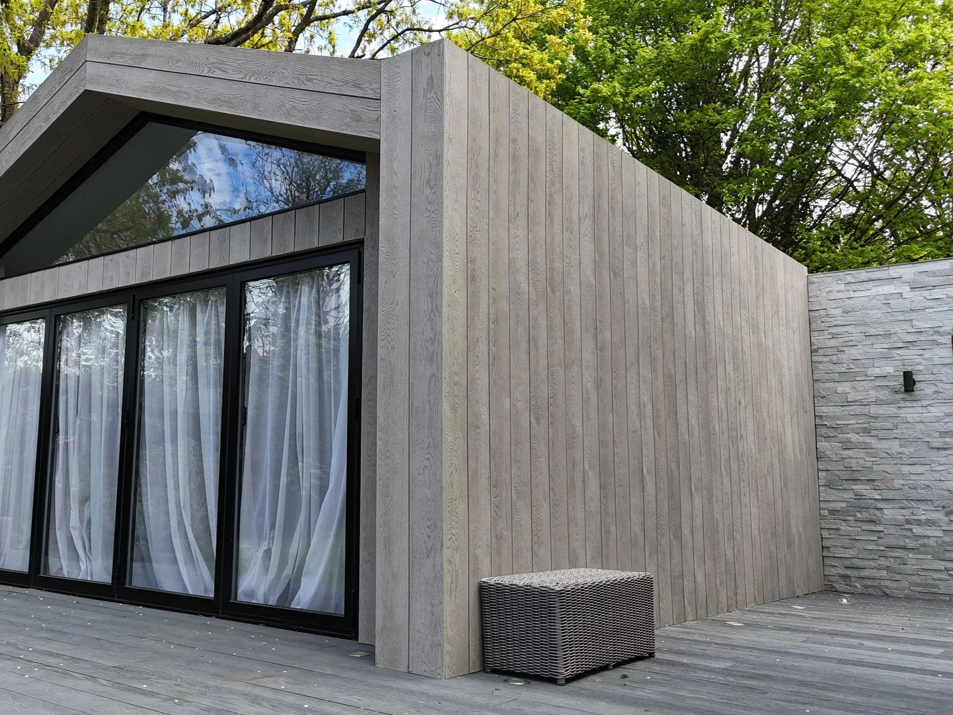 Millboard Composite Cladding in London Bespoke garden room.png
