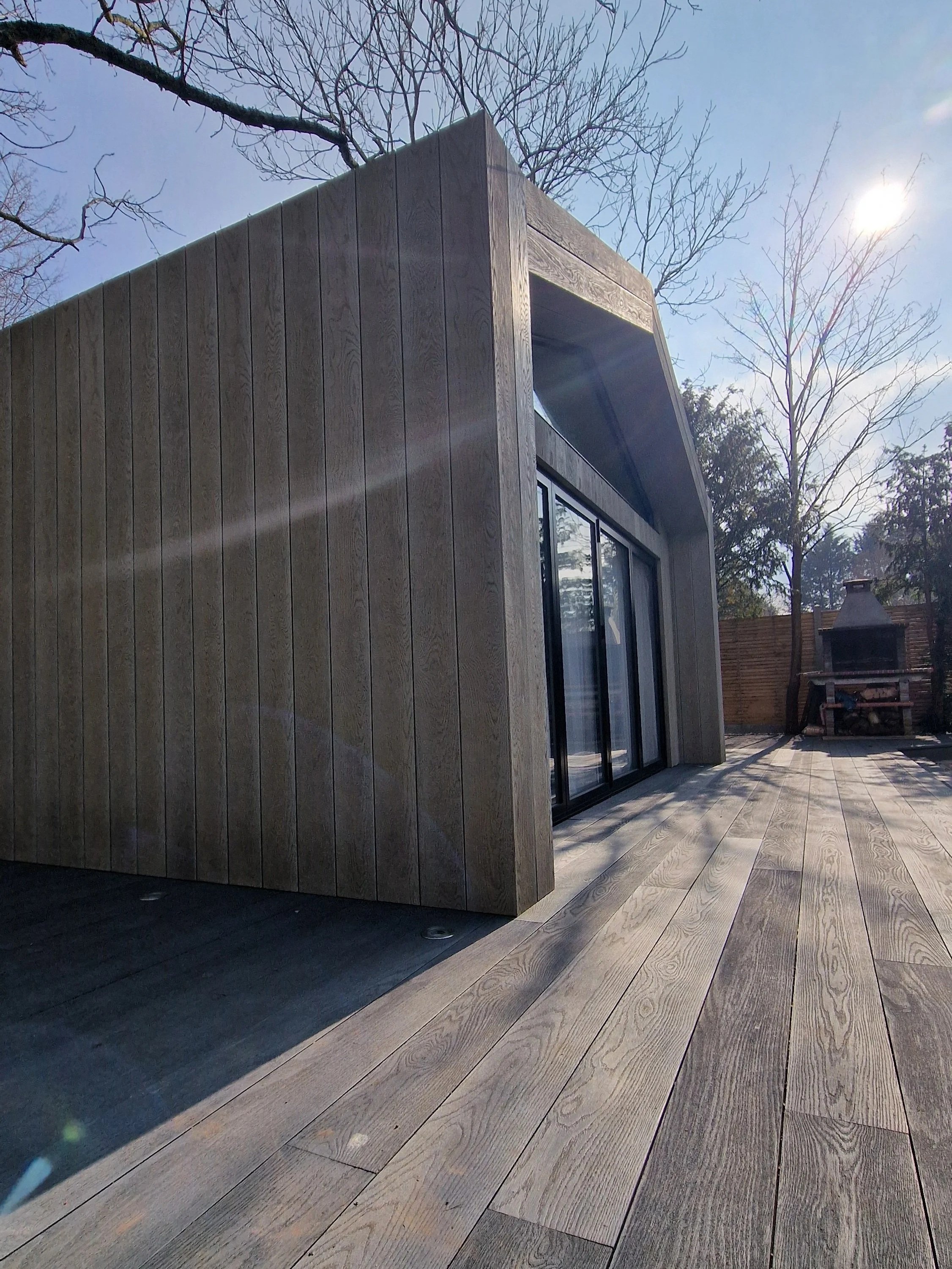 Bespoke garden room with Millboard decking London - Decking Gurus.jpg