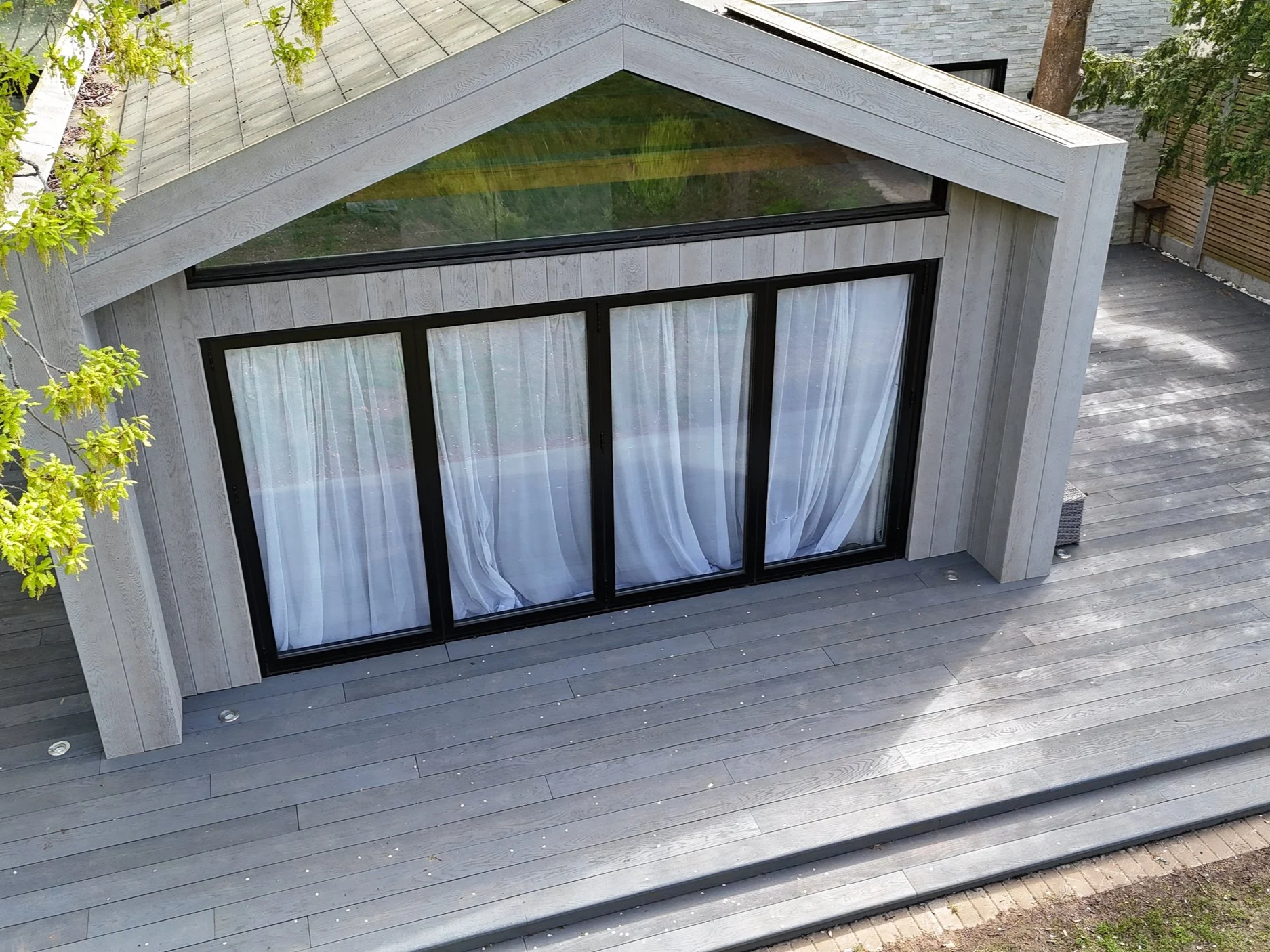 Millboard Composite Cladding in London Bespoke garden room.png