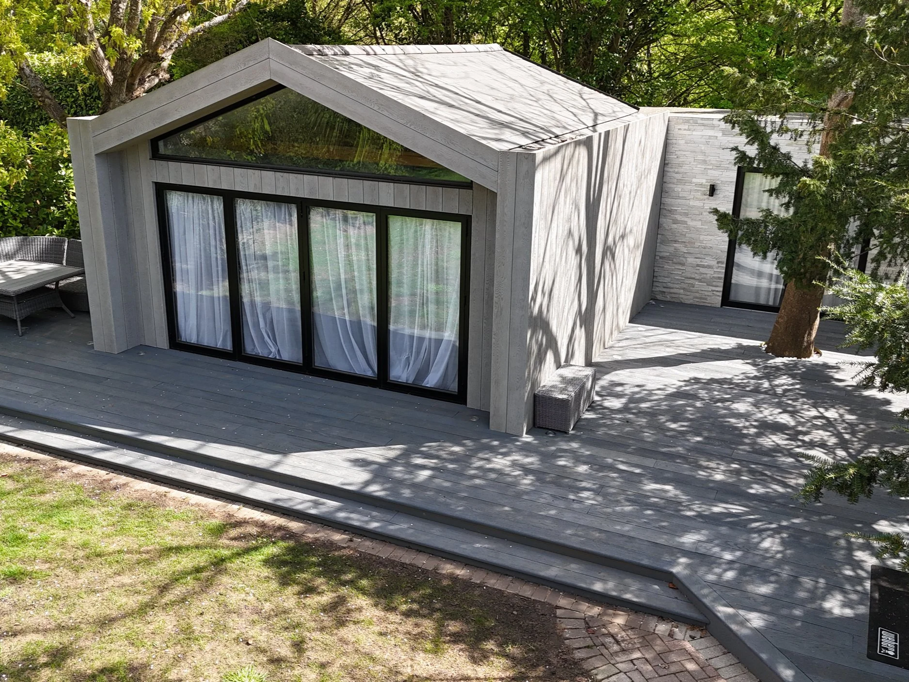 Millboard Composite Cladding in London Bespoke garden room.png