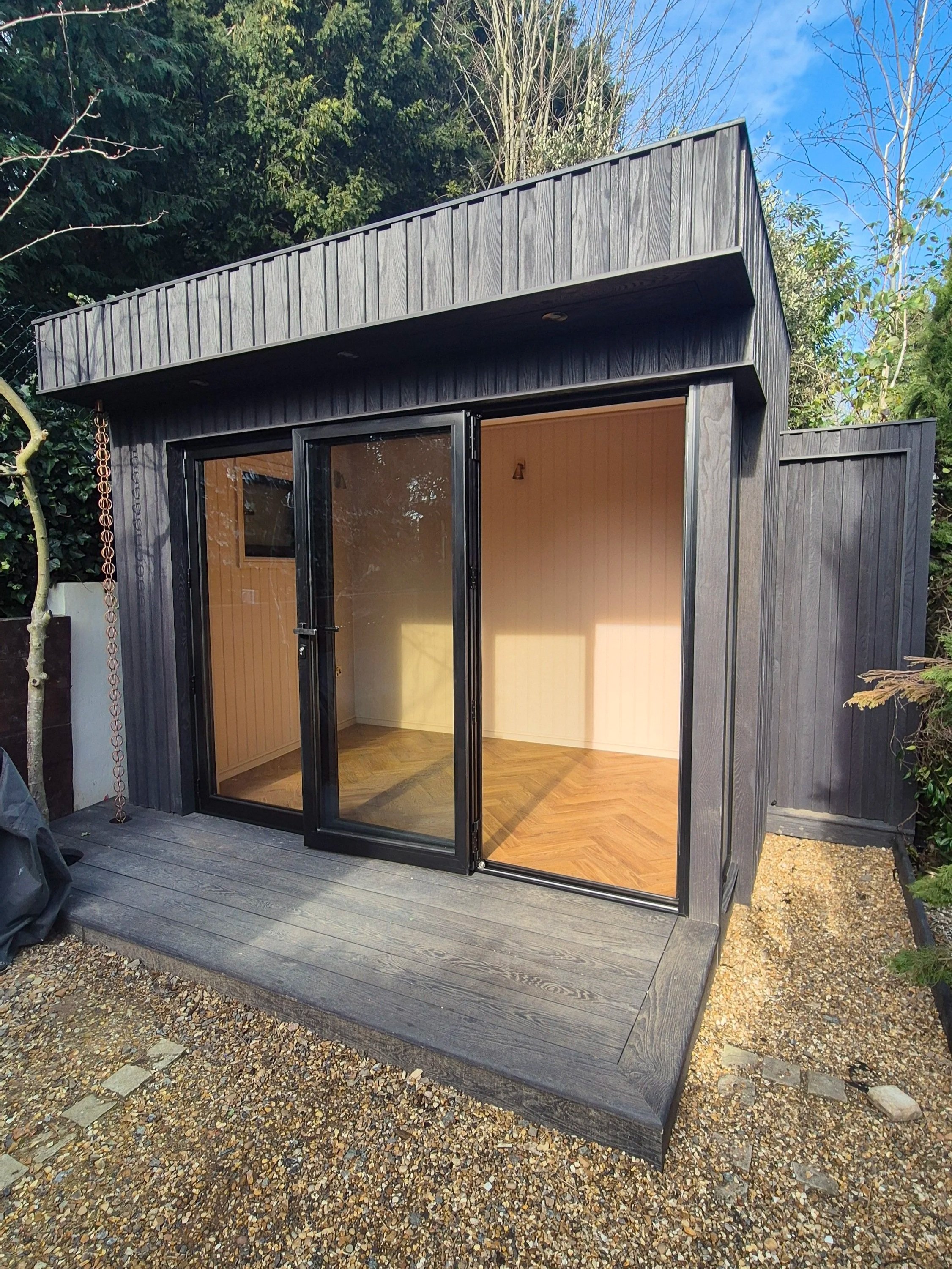 Millboard Board & Batten Composite Cladding in London Garden Room.jpg