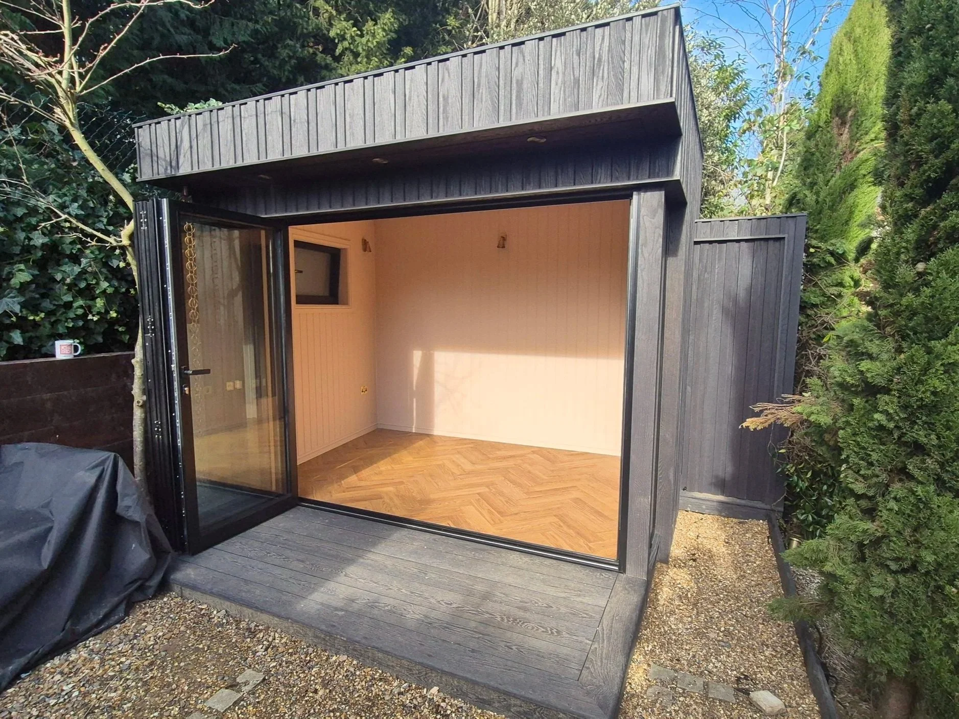 Millboard Board & Batten Composite Cladding in London Garden Room.jpg