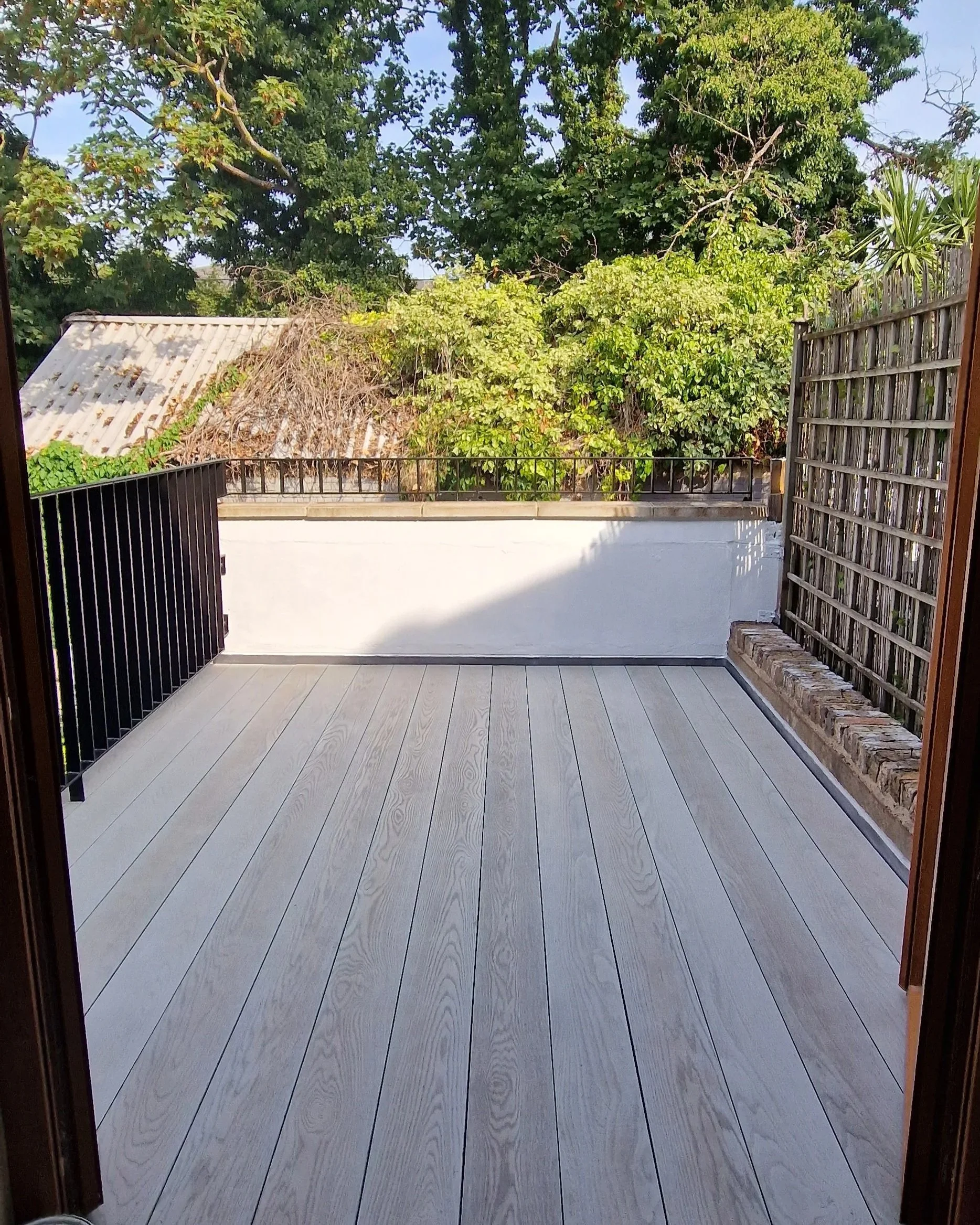 Rooftop+Terrace+Transformation+with+Millboard+Smoked+Oak+%E2%80%93+London+%287%29.jpg
