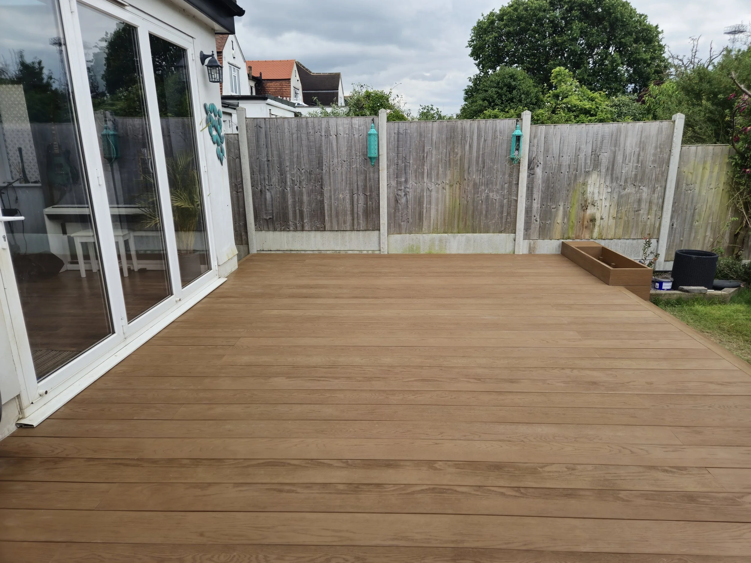 Golden Oak Millboard Decking with Integrated Planters Romford.jpg