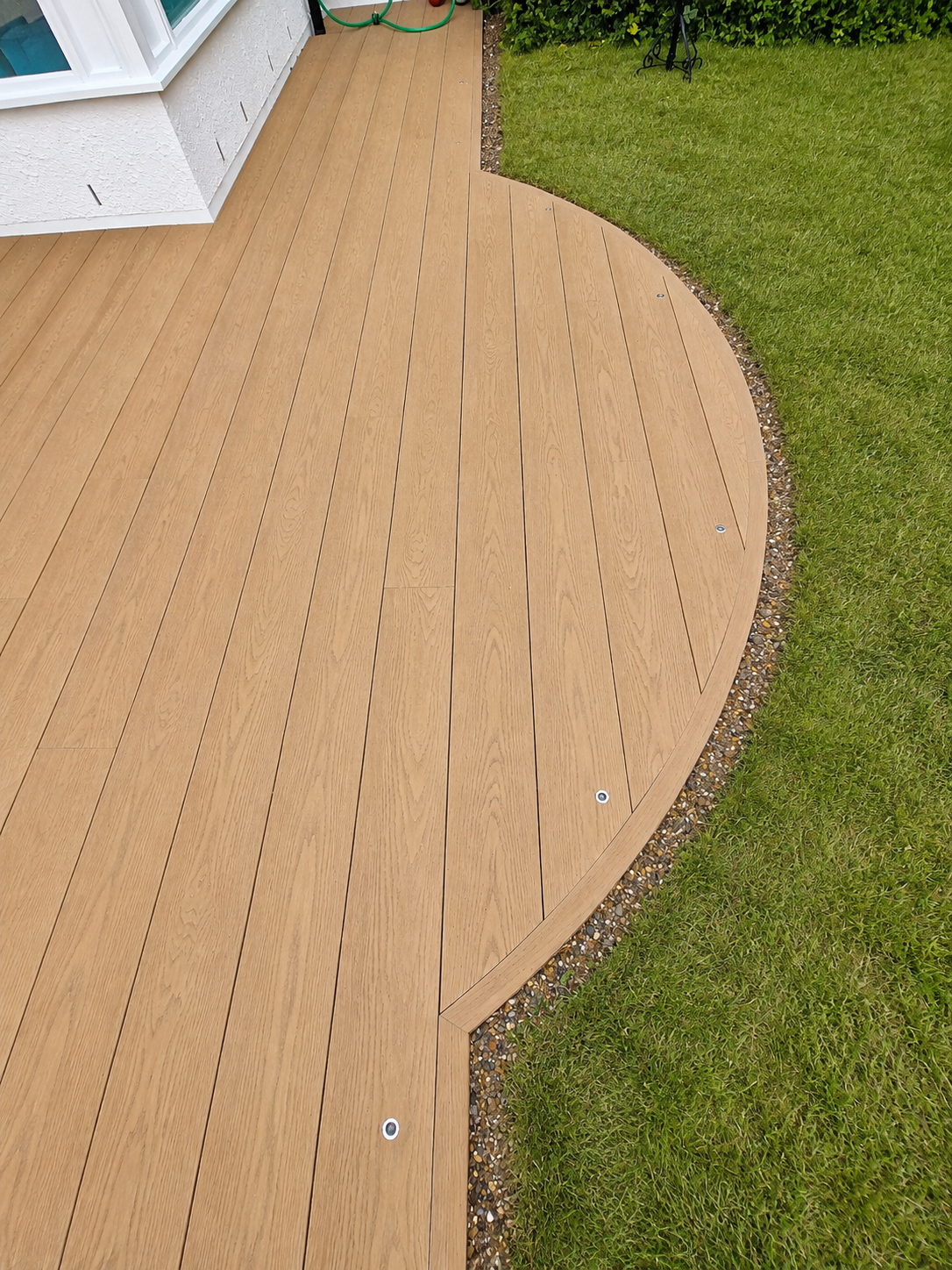 Decking with Bespoke Integrated Bench Seating – London (1).png