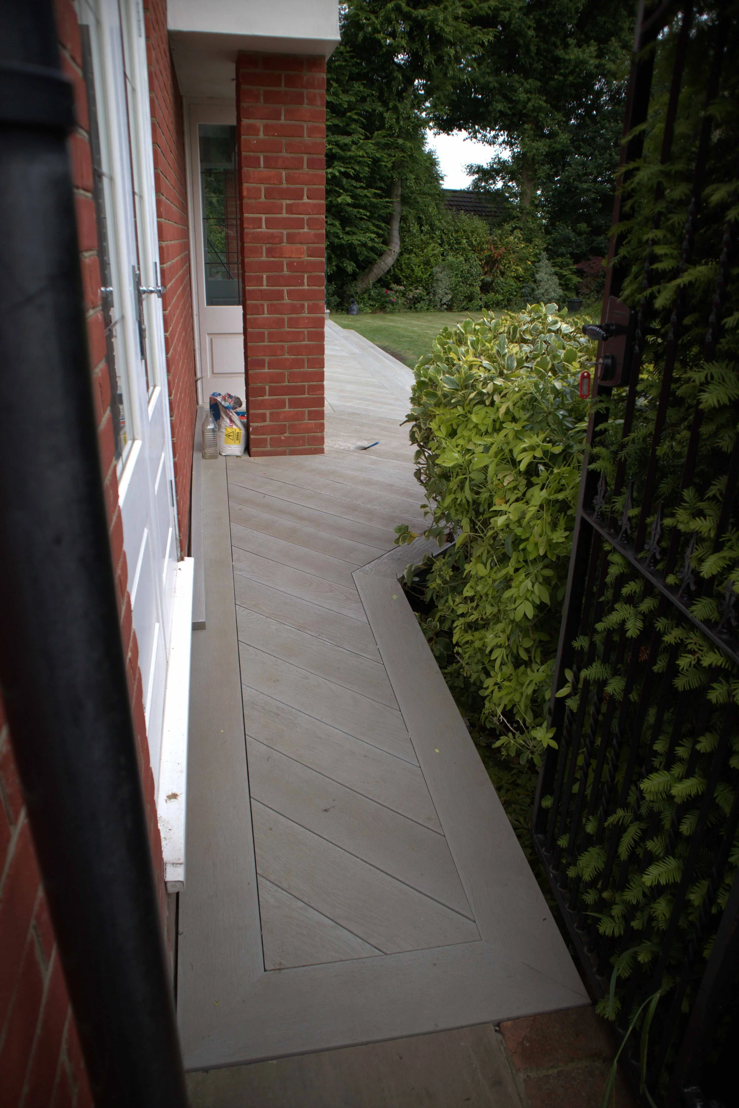 Millboard Decking with Frameless Glass Balustrades Brentwood.jpg