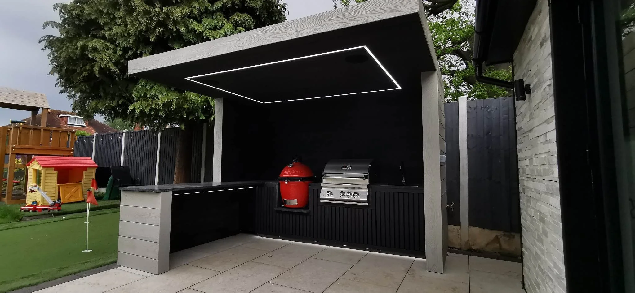 Millbord Composite cladding in London outdoor kitchen.jpg