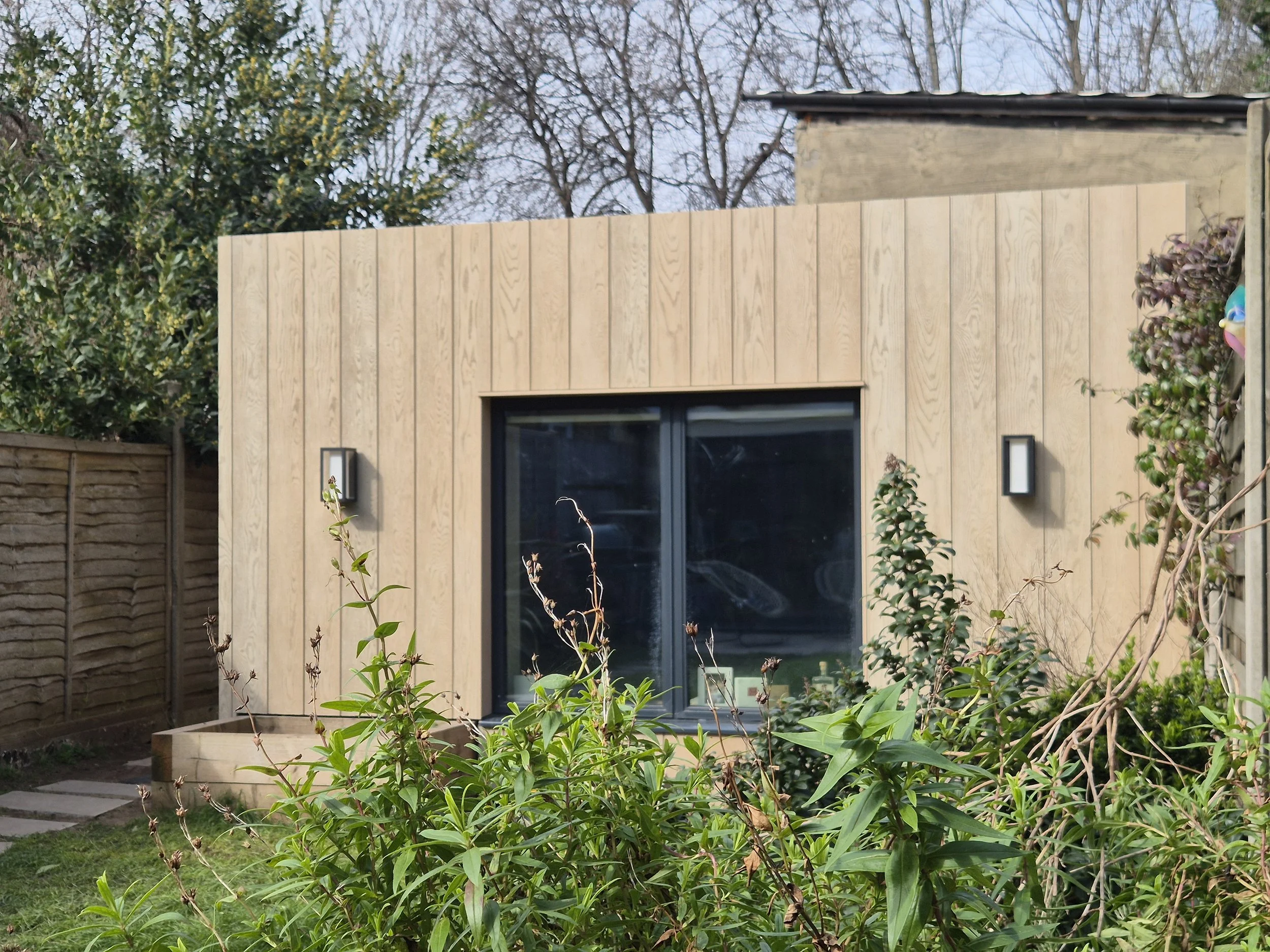 Envello Cladding in Golden Oak