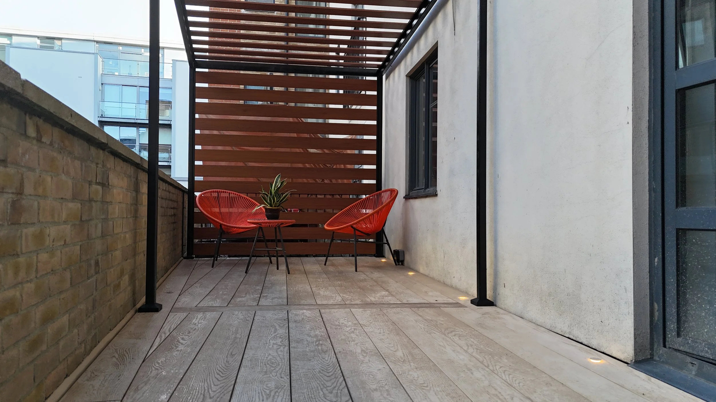Luxury Millboard Limed Oak Balcony Decking with Bespoke Golden Oak Bench Planter & Pergola in London (15).JPG