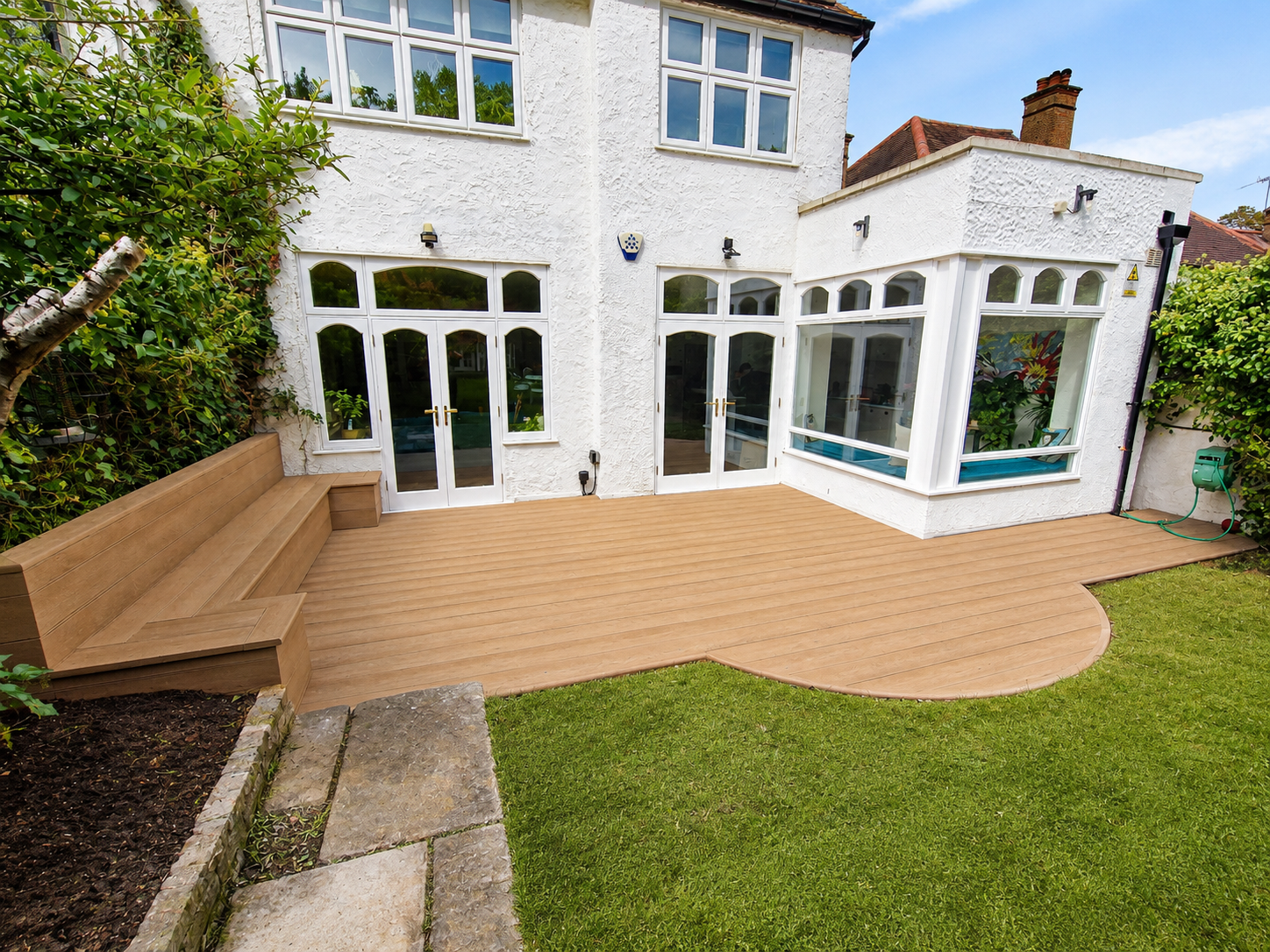 Decking with Bespoke Integrated Bench Seating – London (2).png