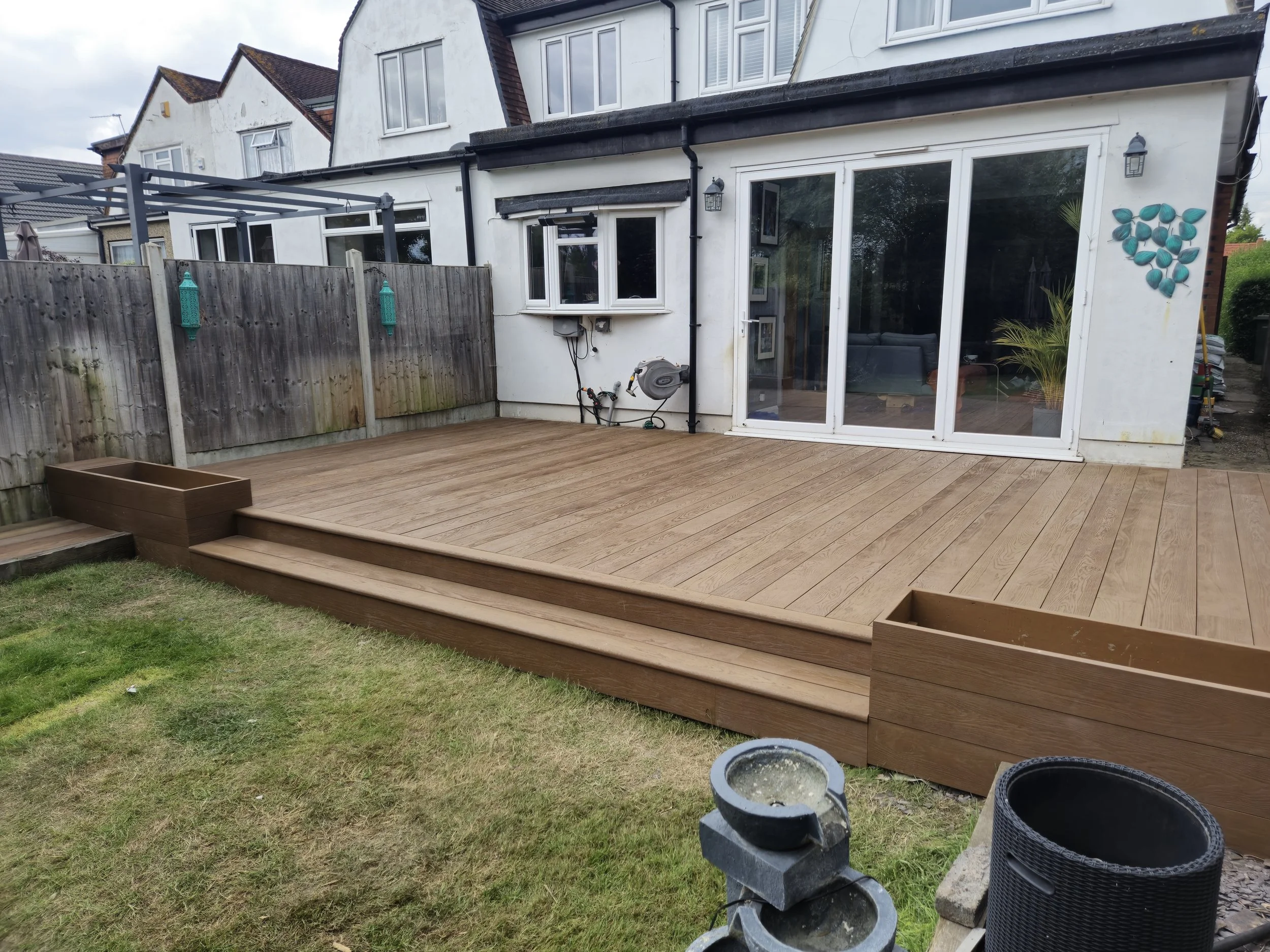 Golden Oak Millboard Decking with Integrated Planters Romford.jpg
