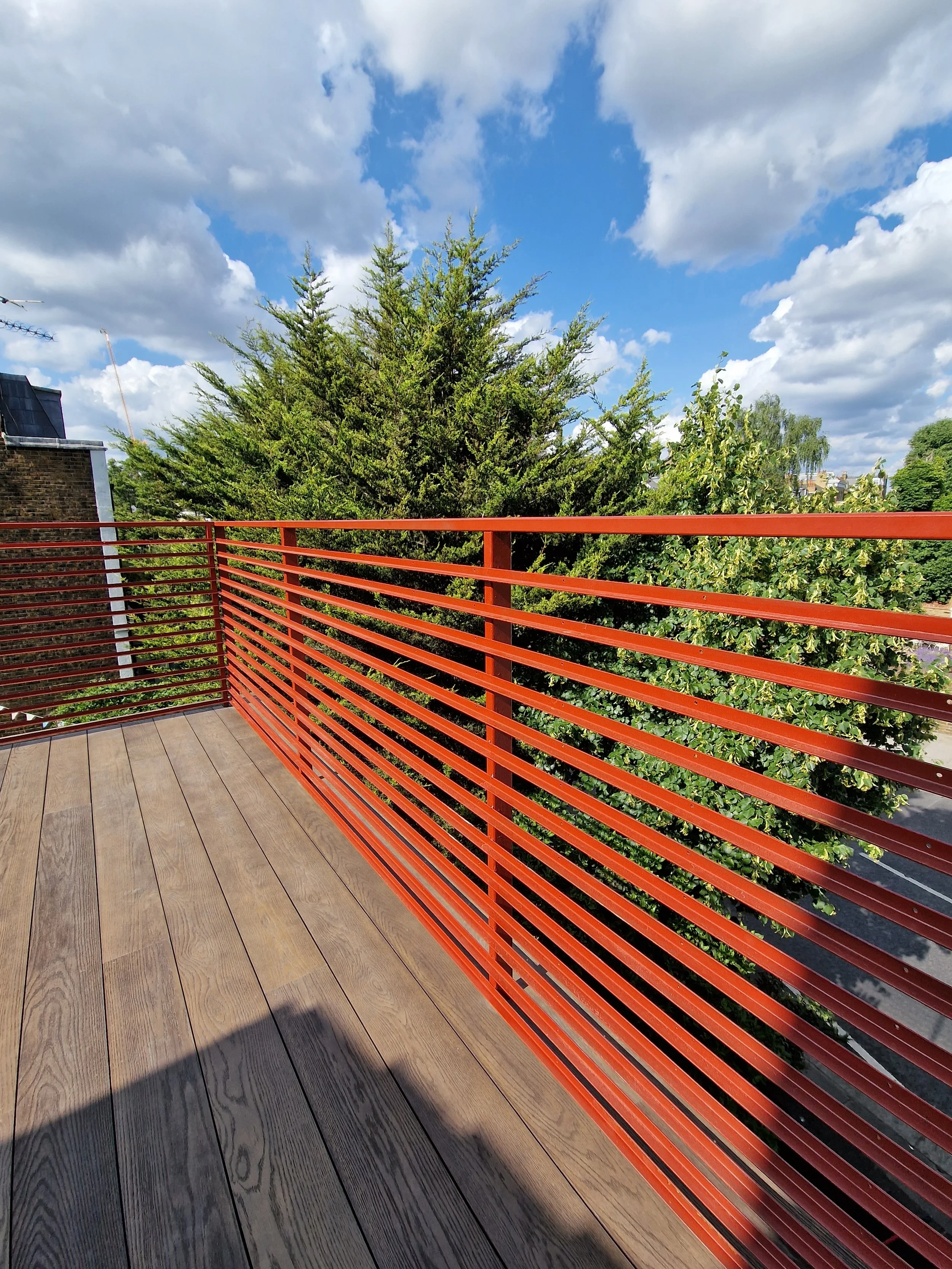 Structural Rooftop Terrace Transformation with Millboard Antique Oak – London (9).jpg