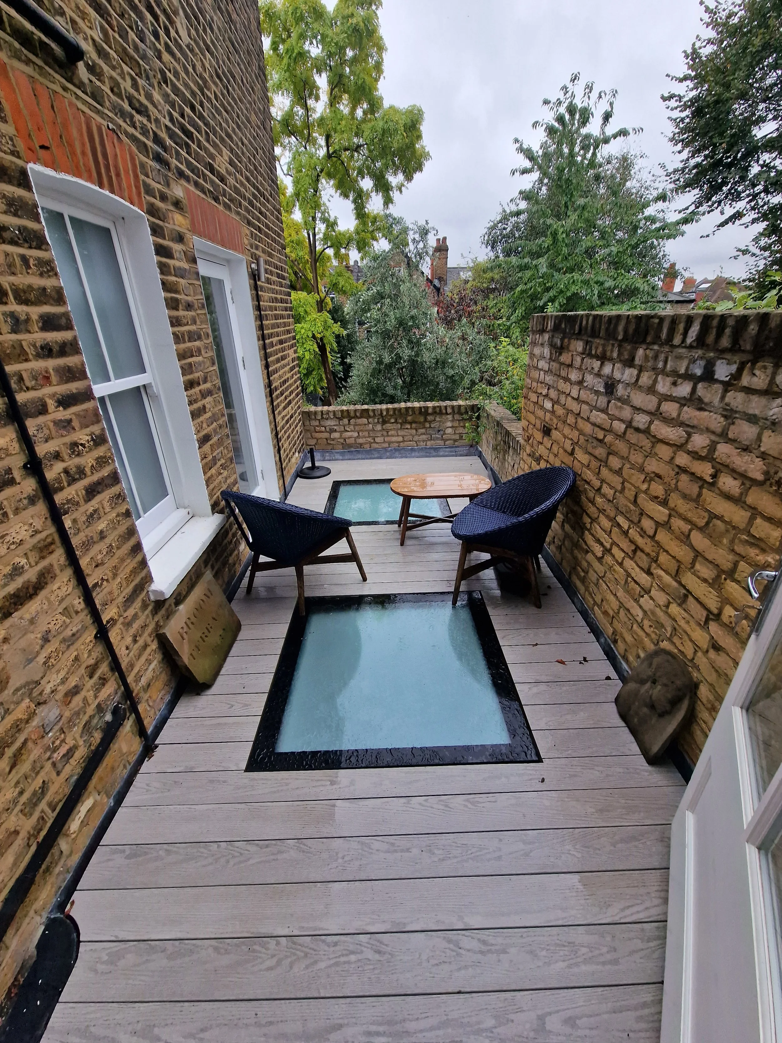 Rooftop Terrace with Millboard Smoked Oak Over Structural Skylights – London (5).jpg