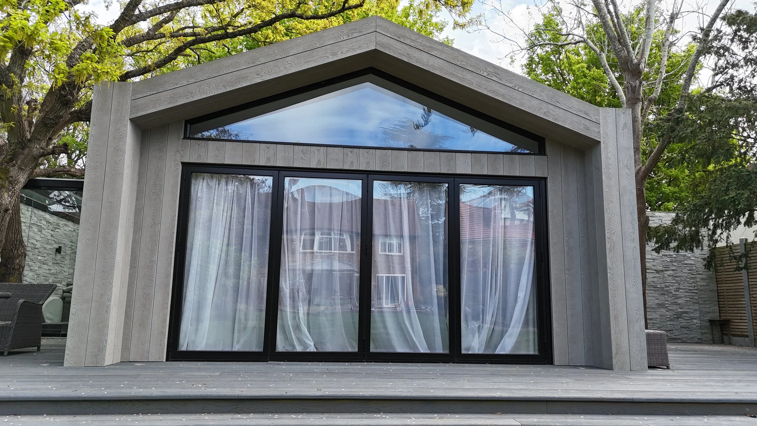 Millboard Composite Cladding in London Bespoke garden room.JPG