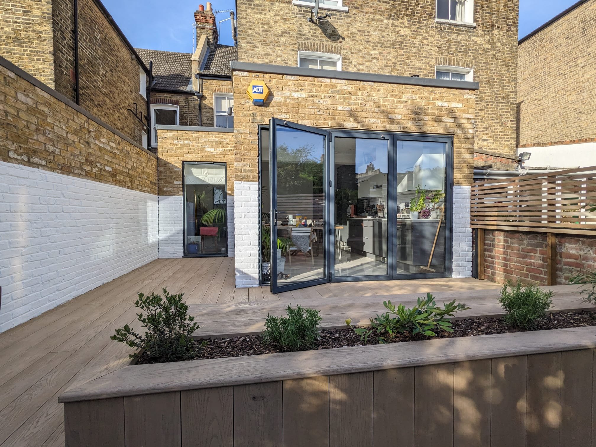 Decking, Bespoke Planters & Architectural Wall Finishes – London (1).jpg