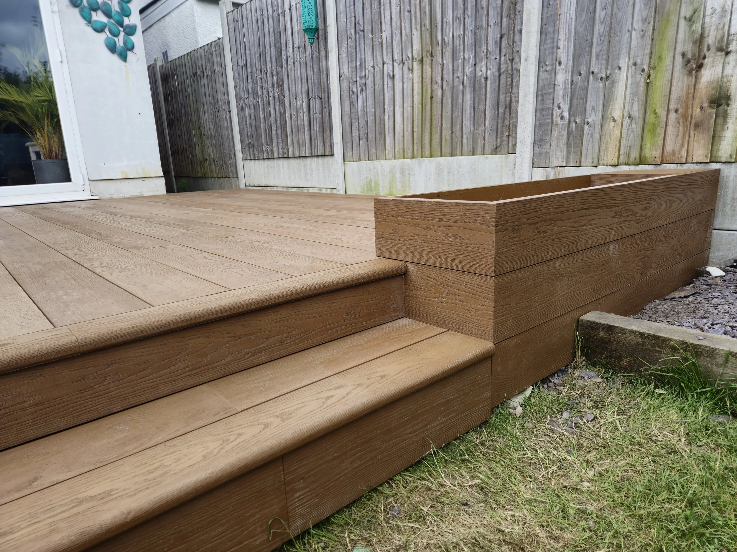 Golden Oak Millboard Decking with Integrated Planters Romford.jpg