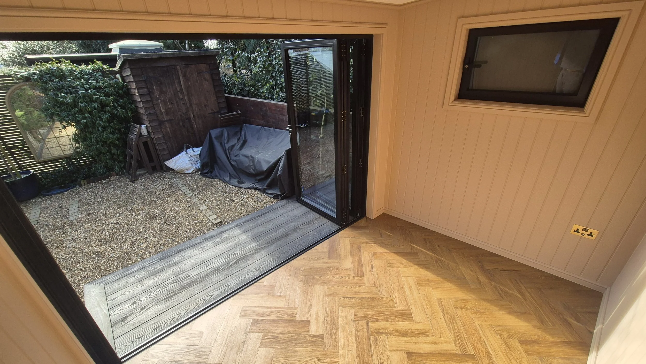 Millboard Board & Batten Composite Cladding in London Garden Room.jpg