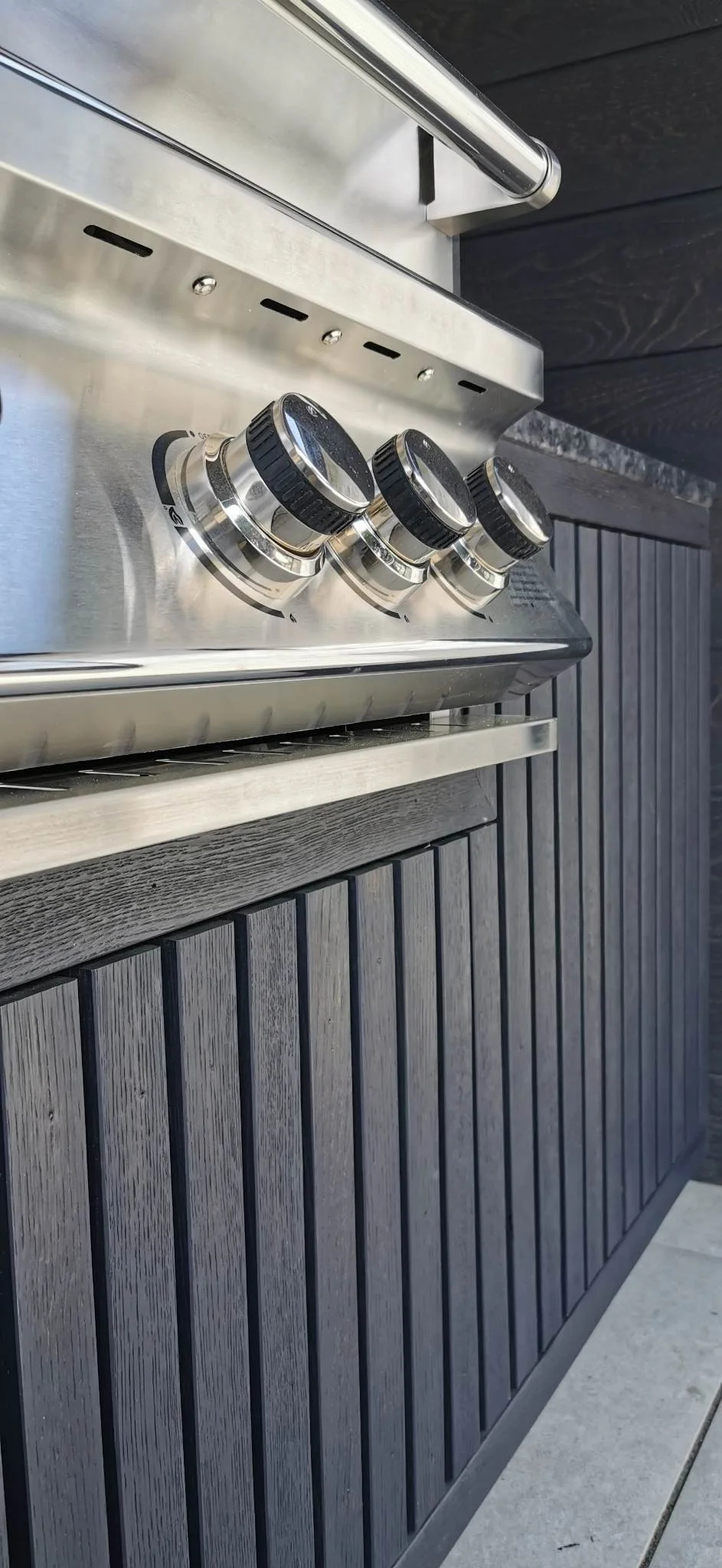 Millbord Composite cladding in London outdoor kitchen.jpg
