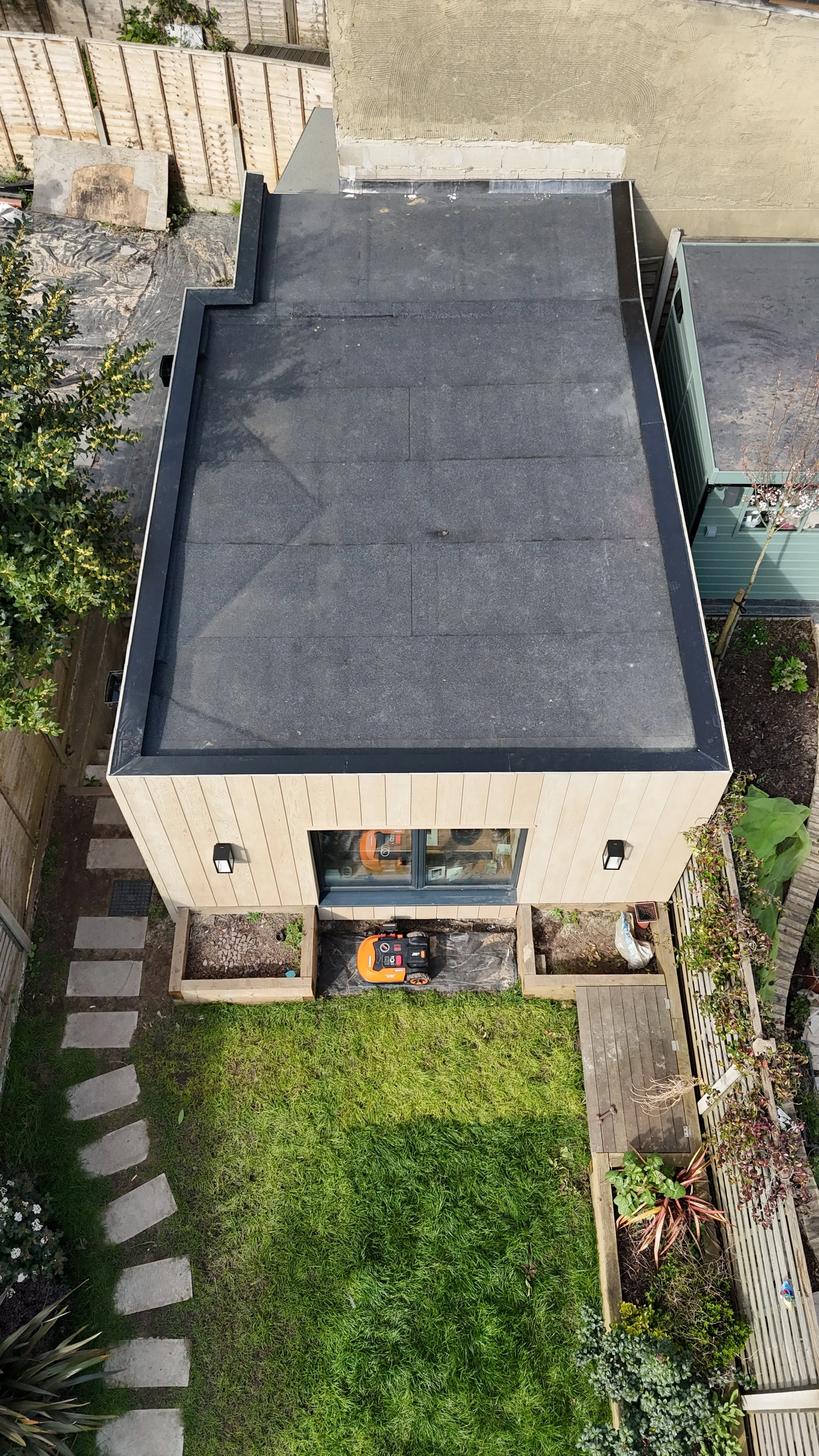 Millboard Envello Cladding in Golden Oak London.JPG