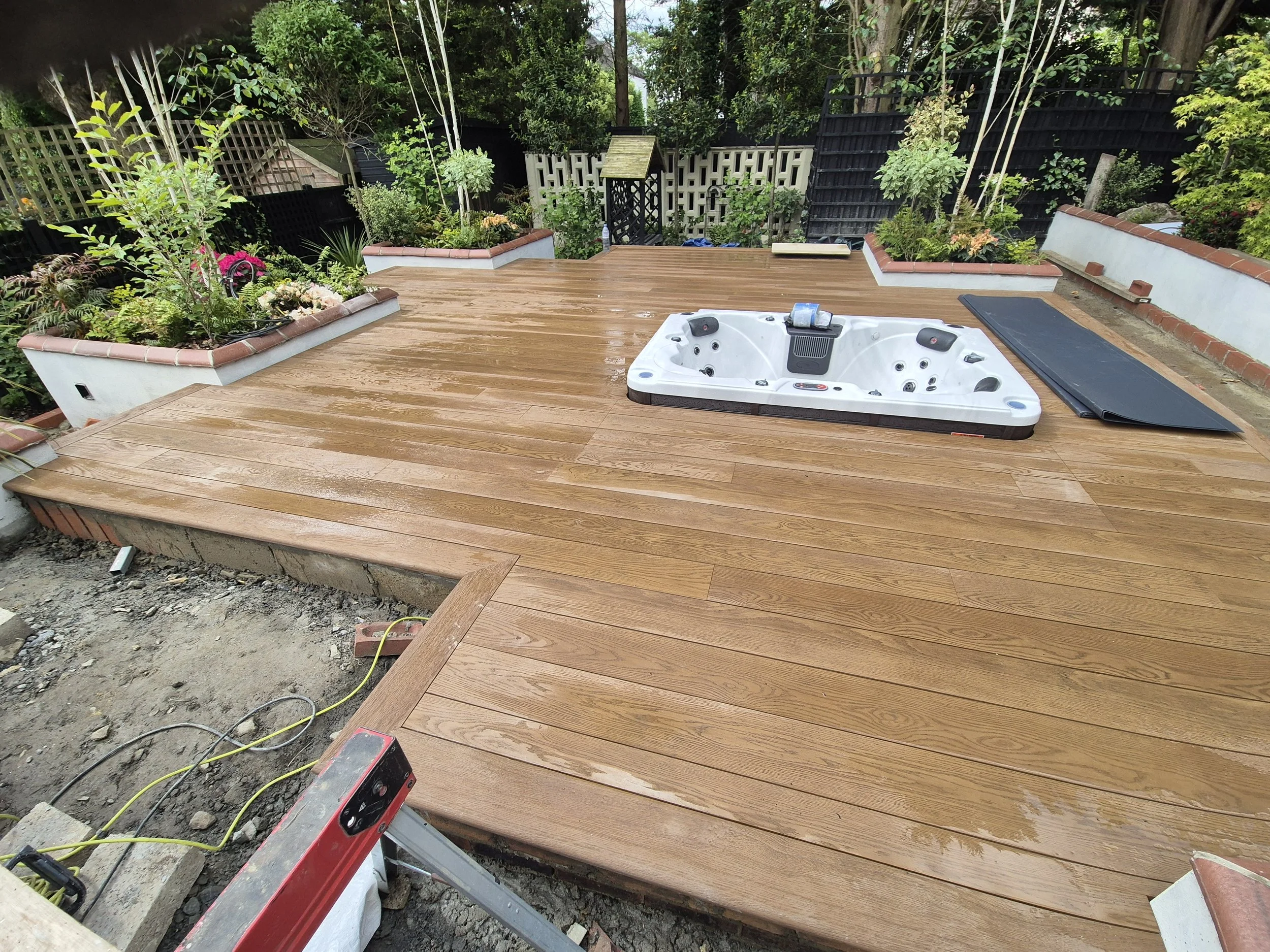 Luxury Millboard Golden Oak Decking with Sunken Hot Tub & Bespoke Garden Transformation – London (2).jpg