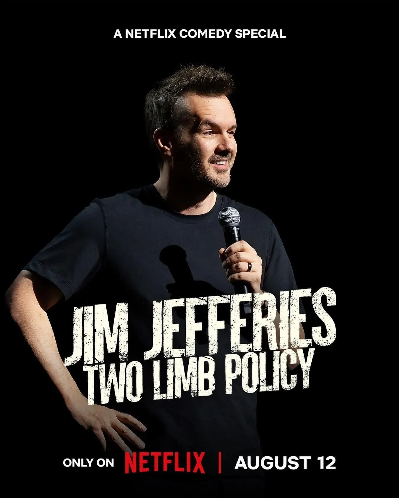 Promotional poster for a comedy special featuring Jim Jefferies titled 'Two Limbs Policy,' available on Netflix starting August 12.