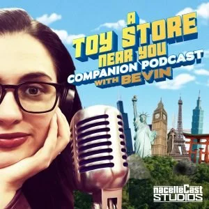 Cover art for the 'A Toy Store Near You' podcast featuring a woman with glasses, a vintage microphone, and landmarks like the Statue of Liberty, Big Ben, and the Eiffel Tower in the background.