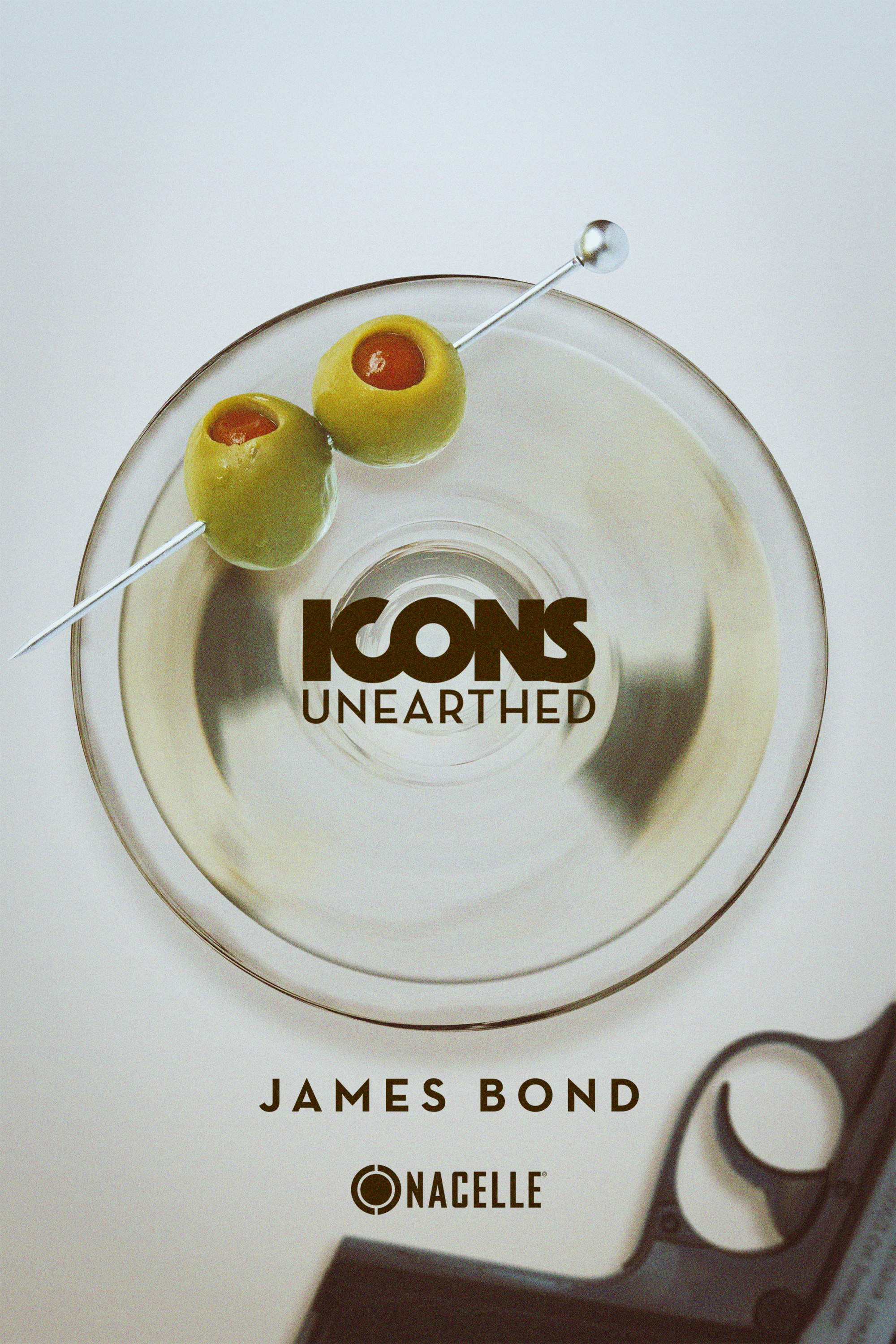 Promotional poster for "Icons Unearthed: James Bond" on a white surface, with two green olives on a skewer resting in a cocktail, and a pistol partially visible at the bottom right corner.