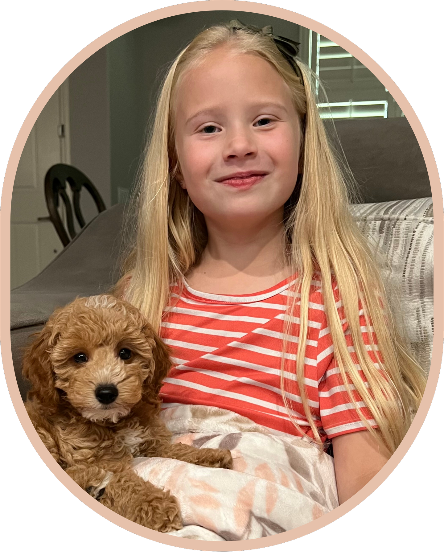Little Girl with Petite Goldendoodle Puppy