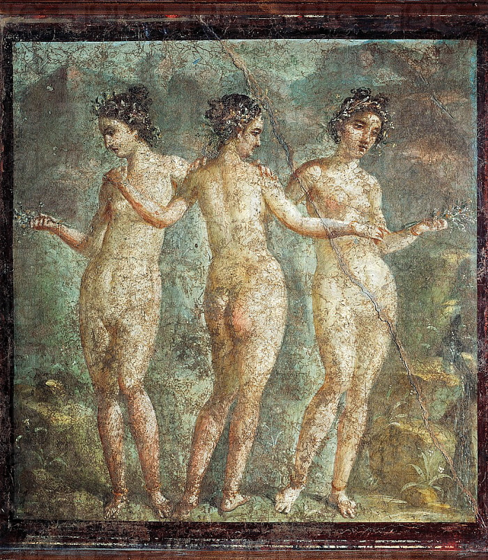 Ancient fresco painting of three nude women walking with their arms linked, set against a natural background.