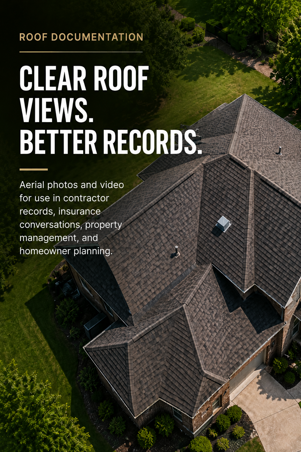 Aerial view of a house with a brown shingled roof and surrounding green yard and trees.