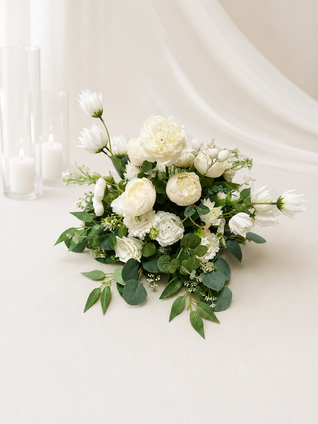 Short Faux floral arrangements. 
Rental Price: Inquire for options