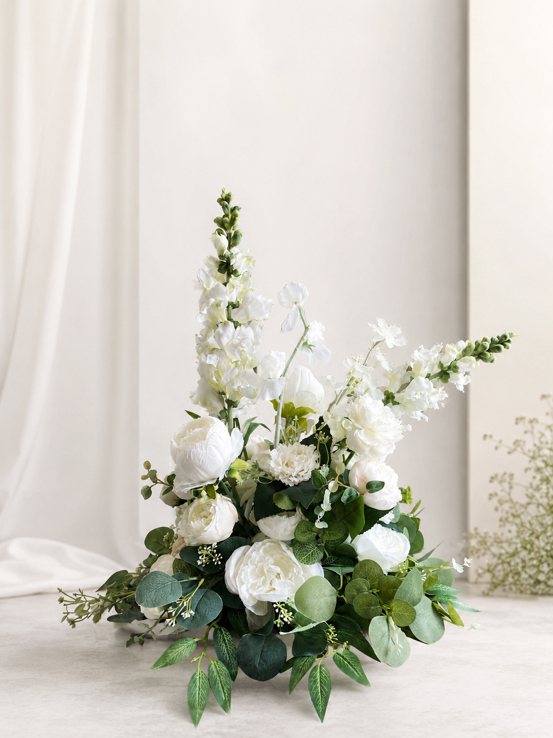 Tall Faux floral arrangements. Designed without a vase.
Rental Price: Inquire for options