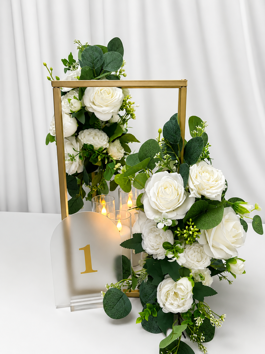 Geometric metal stand centerpiece. 
Rental Price: $15 each

