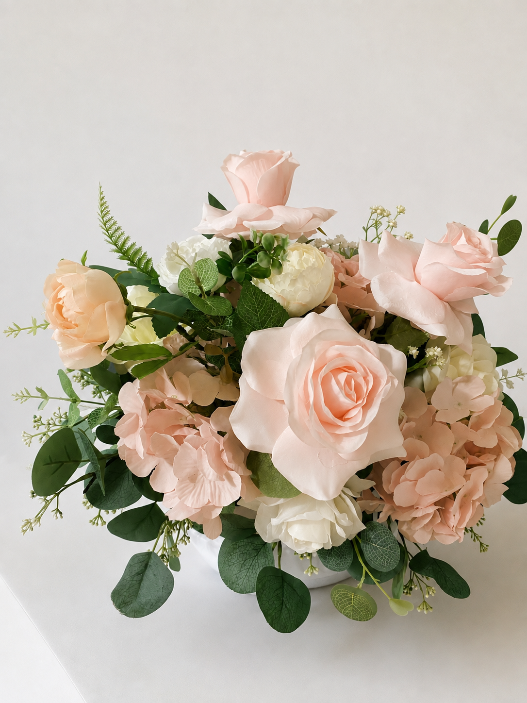 Short Faux floral arrangements. 
Starting at $15.  Inquire for options