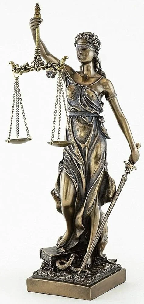 Bronze statue of Lady Justice holding scales in her left hand and a sword in her right hand, blindfolded, standing on a small base with a snake at her feet.