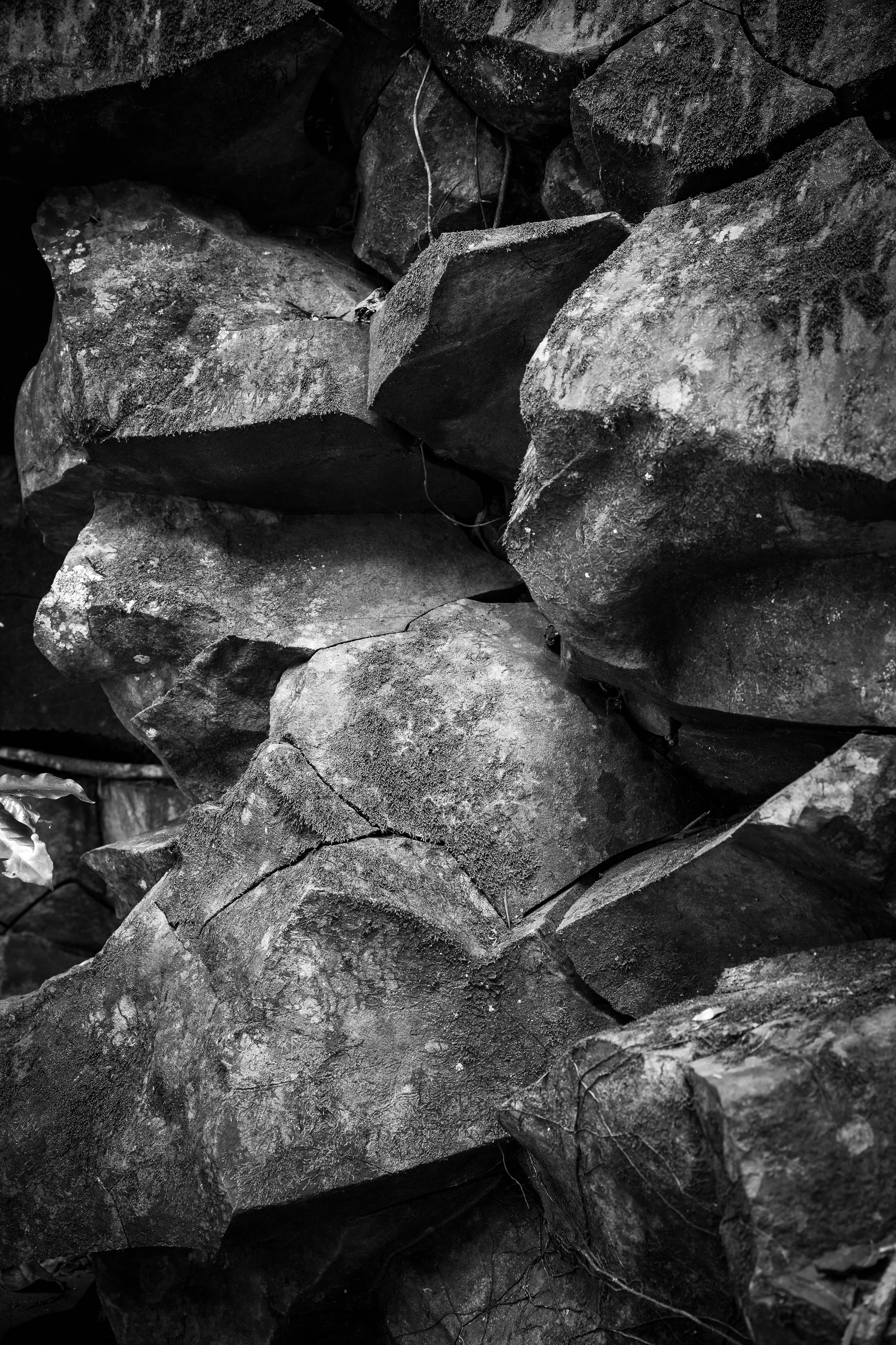 Maui, Hawaii - Black and white photo of stacked rocks and stones.