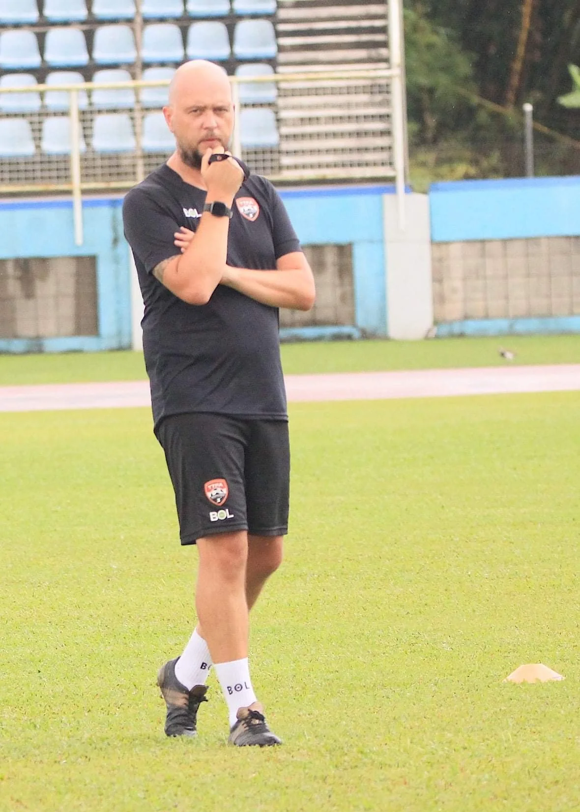 James Thomas on field in Trinidad 