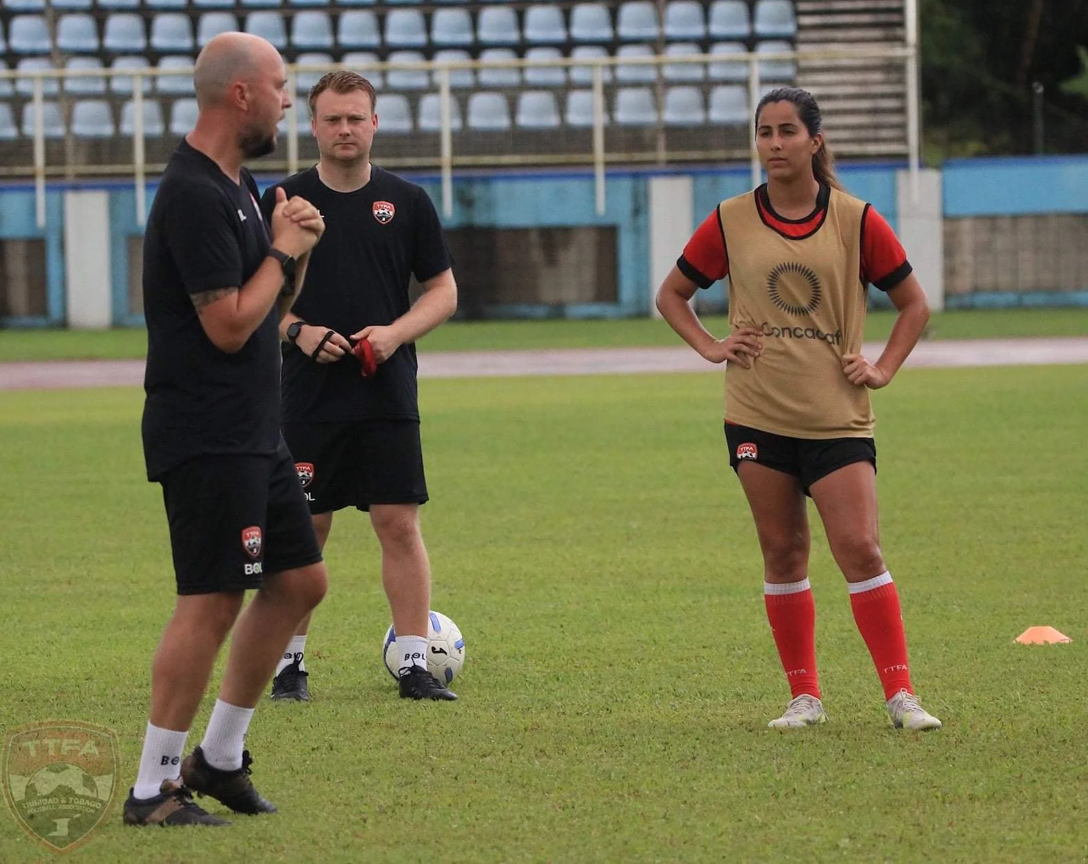James Thomas Coach Trinidad and Tobago giving coaching details to players