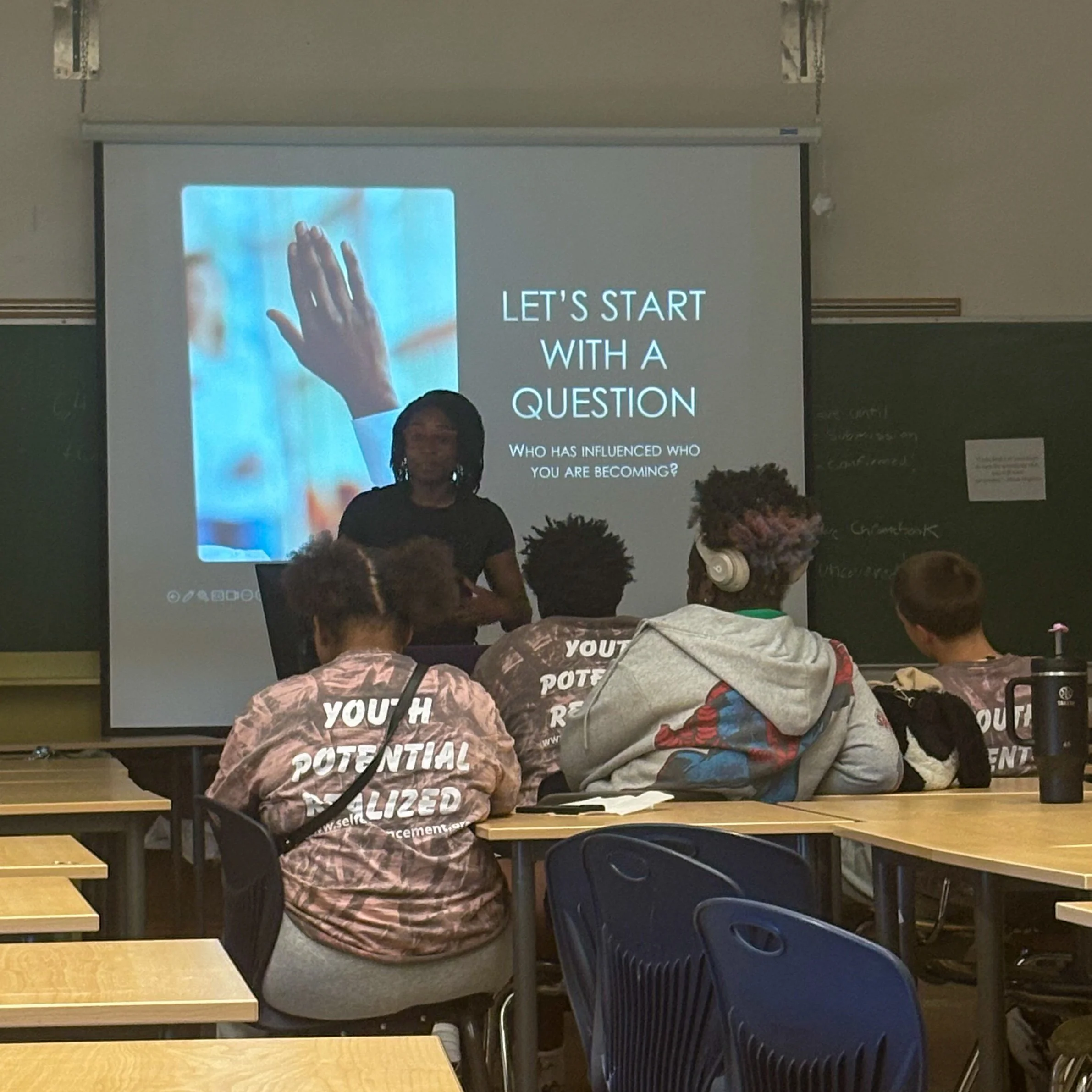 Black Ember House founder Rashida Saunders leading a classroom discussion with students about who has influenced the people they are becoming.