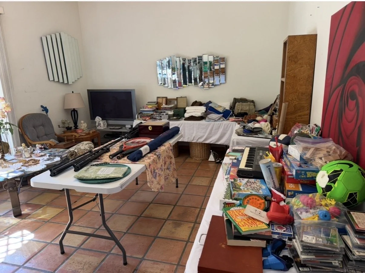 Furniture was re-arranged to open the living room up in the condo and create space to showcase items.