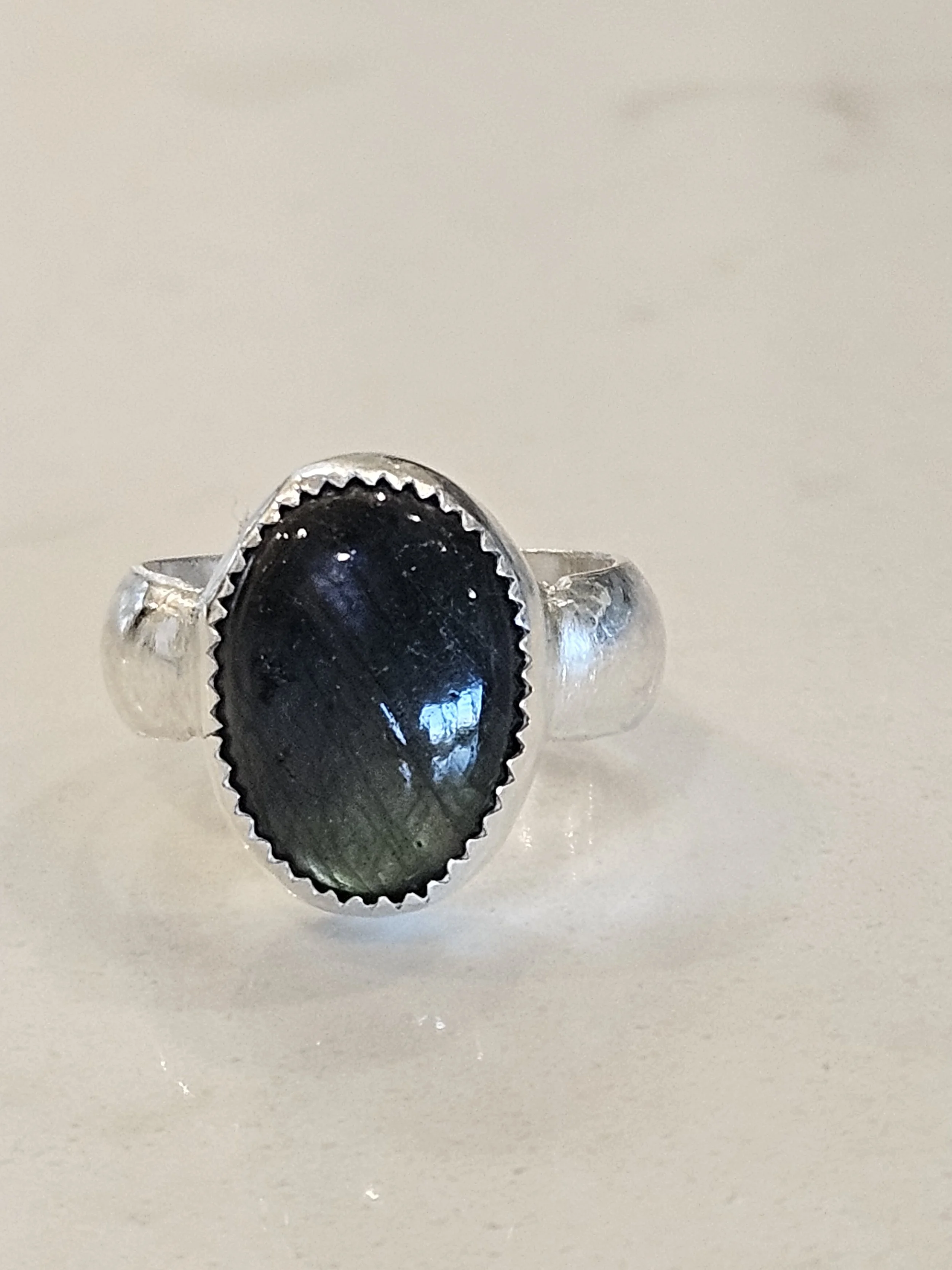 Sterling silver ring with oval Labradorite stone. Size 5.5