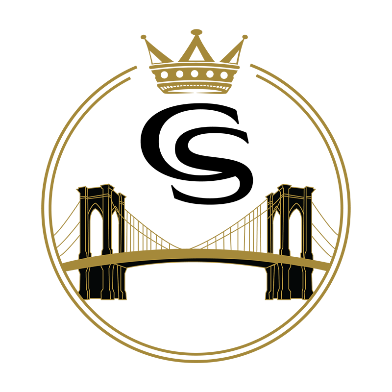 A logo featuring a gold crown above a circular design with a gold outline. Inside the circle is a stylized black and white letter 'S' and a gold illustration of a suspension bridge.