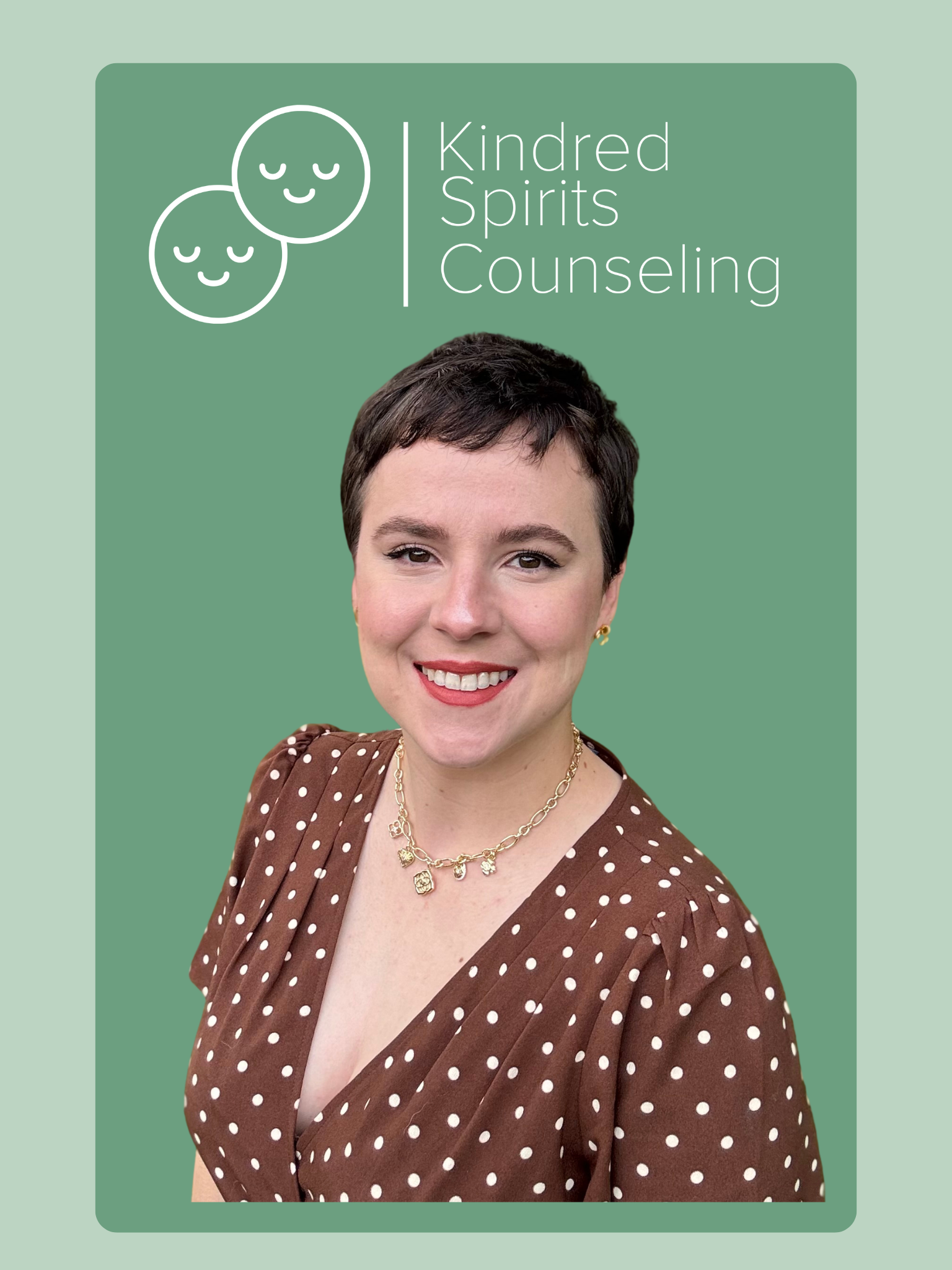 Therapist, Ryann Taylor, a woman with short dark hair, wearing a brown polka dot dress and gold jewelry, smiling in front of a green background with a logo and the words "Kindred Spirits Counseling" and two smiling face icons.