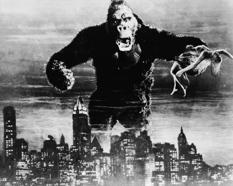 Iconic image of the original "King Kong" -- released in 1933, and shot in B&W. Directed by Merian C. Cooper and Ernest B. Schoedsack.