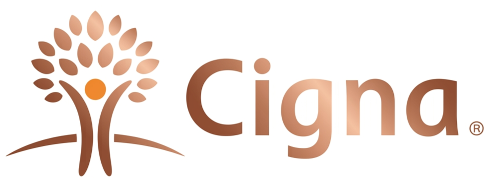 Cigna logo featuring a stylized tree with a human figure at the center and the company name in brown text.