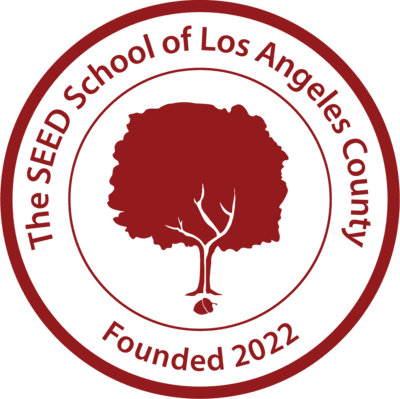 Logo of The seed School of Los Angeles County, featuring a tree with a face, encircled by the school's name and founded year 2022.