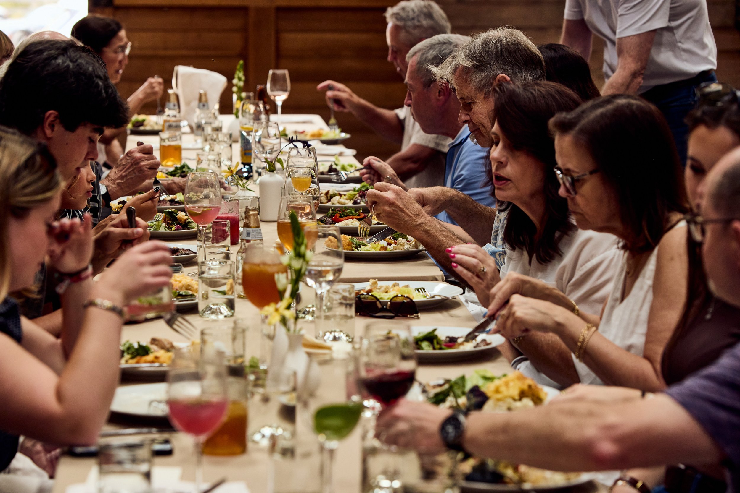 Guests enjoying a catered farm-to-table meal at a private Bay Area event